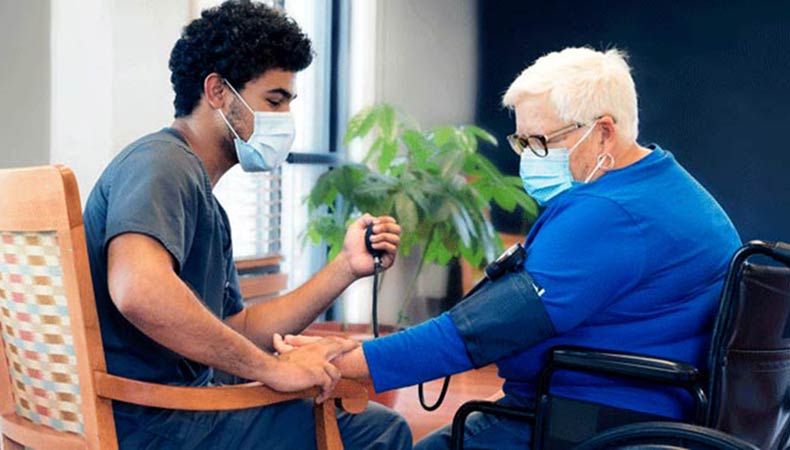 Nursing Student with Patient